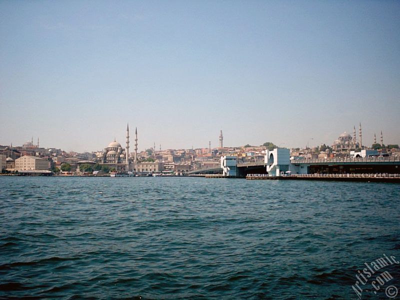 View of Eminonu coast, (from left) Sultan Ahmet Mosque (Blue Mosque), Yeni Cami (Mosque), (at far behind) Beyazit Mosque, Beyazit Tower, Galata Brigde and Suleymaniye Mosque from the shore of Karakoy in Istanbul city of Turkey.
