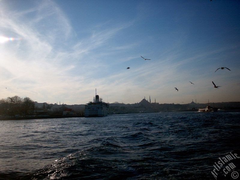 View of Eminonu coast, Suleymaniye Mosque and Fatih Mosque from the Bosphorus in Istanbul city of Turkey.
