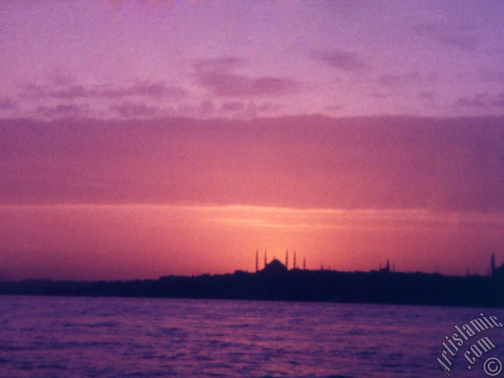 A sunset view of Sarayburnu coast and Sultan Ahmet Mosque (Blue Mosque) from the Bosphorus in Istanbul city of Turkey.
