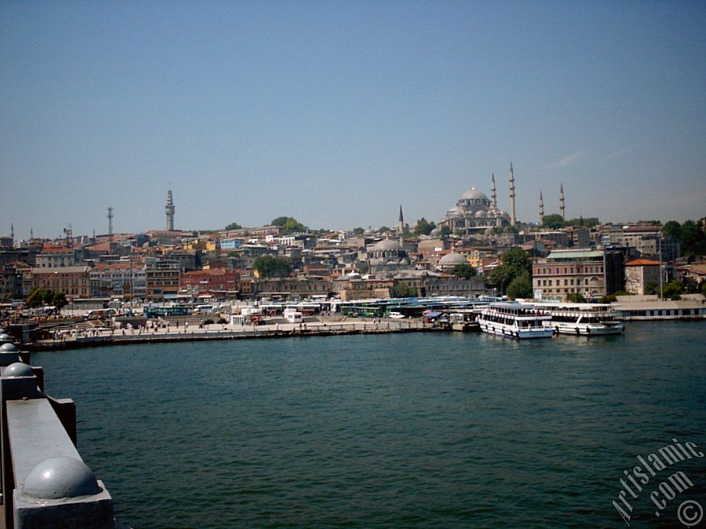 View of coast, (from left) Beyazit Tower, below Rustem Pasha Mosque and above it Suleymaniye Mosque from Galata Bridge located in Istanbul city of Turkey.
