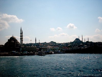 View of (from left) Yeni Cami (Mosque), Beyazit Tower, Egyptian Bazaar (Spice Market), Suleymaniye Mosque and (below) Rustem Pasha Mosque from the shore of Eminonu in Istanbul city of Turkey. (The picture was taken by Artislamic.com in 2004.)