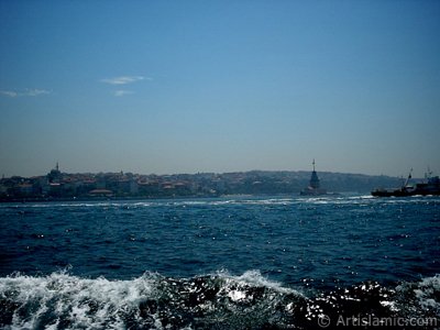 View of Kiz Kulesi (Maiden`s Tower) and Uskudar coast from the Bosphorus in Istanbul city of Turkey. (The picture was taken by Artislamic.com in 2004.)