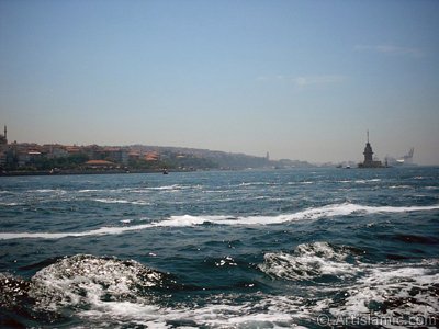 View of Kiz Kulesi (Maiden`s Tower) and Uskudar coast from the Bosphorus in Istanbul city of Turkey. (The picture was taken by Artislamic.com in 2004.)