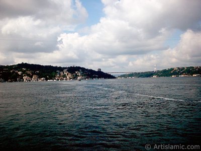 View towards Fatih Sultan Mehmet Bridge over the Bosphorus from between Arnavutkoy shore and Vanikoy shore in the middle of the Bosphorus in Istanbul city of Turkey. (The picture was taken by Artislamic.com in 2004.)