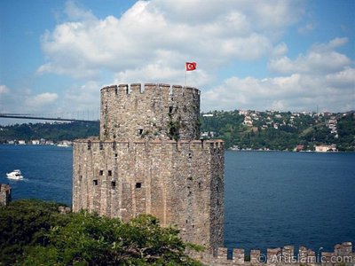 View of the Bosphorus and Fatih Sultan Mehmet Bridge from Rumeli Hisari which was ordered by Sultan Mehmet the Conqueror to be built before conquering Istanbul in 1452 in Turkey. (The picture was taken by Mr. Mustafa one of the visitors of Artislamic.com in 2004)