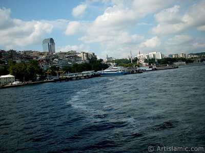 View of Kabatas coast and Valide Sultan Mosque at distant from the Bosphorus in Istanbul city of Turkey. (The picture was taken by Artislamic.com in 2004.)