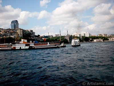 View of Kabatas coast and Valide Sultan Mosque at distant from the Bosphorus in Istanbul city of Turkey. (The picture was taken by Artislamic.com in 2004.)