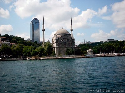 View of Dolmabahce coast and Valide Sultan Mosque from the Bosphorus in Istanbul city of Turkey. (The picture was taken by Artislamic.com in 2004.)