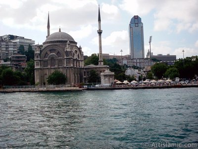 View of Dolmabahce coast and Valide Sultan Mosque from the Bosphorus in Istanbul city of Turkey. (The picture was taken by Artislamic.com in 2004.)