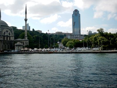 View of Dolmabahce coast and Valide Sultan Mosque from the Bosphorus in Istanbul city of Turkey. (The picture was taken by Artislamic.com in 2004.)