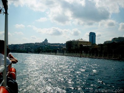 View of Dolmabahce Palace and Valide Sultan Mosque from the Bosphorus in Istanbul city of Turkey. (The picture was taken by Artislamic.com in 2004.)