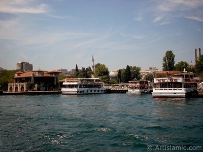 View of Besiktas jetty and Sinan Pasha Mosque its behind from the Bosphorus in Istanbul city of Turkey. (The picture was taken by Artislamic.com in 2004.)