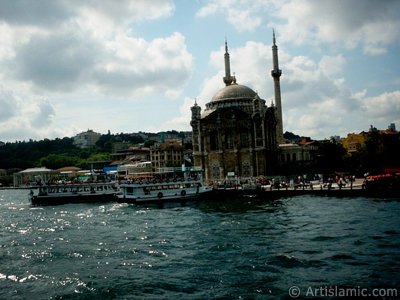 View of Ortakoy coast and Ortakoy Mosque from the Bosphorus in Istanbul city of Turkey. (The picture was taken by Artislamic.com in 2004.)