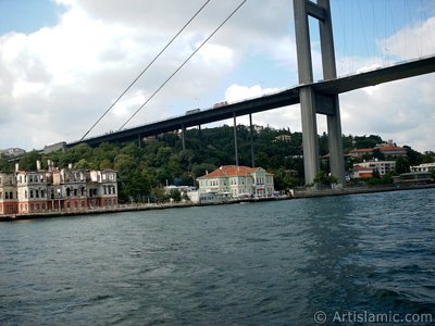 View of Bosphorus Bridge from the Bosphorus in Istanbul city of Turkey. (The picture was taken by Artislamic.com in 2004.)