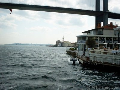 View of Ortakoy coast, Bosphorus Bridge and Ortakoy Mosque from the Bosphorus in Istanbul city of Turkey. (The picture was taken by Artislamic.com in 2004.)