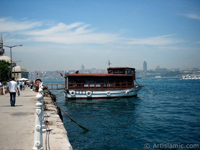 View of the shore, a fisher boat and Semsi Pasha Mosque in Uskudar district of Istanbul city of Turkey. (The picture was taken by Artislamic.com in 2004.)