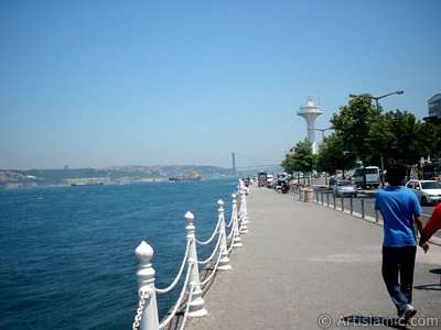 View of the shore and on the horizon Bosphorus Bridge from Uskudar district of Istanbul city of Turkey. (The picture was taken by Artislamic.com in 2004.)