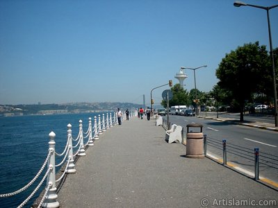 View of the shore and on the horizon Bosphorus Bridge from Uskudar district of Istanbul city of Turkey. (The picture was taken by Artislamic.com in 2004.)