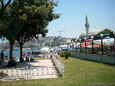 View of fishing people and Semsi Pasha Mosque made by Architect Sinan in Uskudar shore of Istanbul city of Turkey. (The picture was taken by Artislamic.com in 2004.)