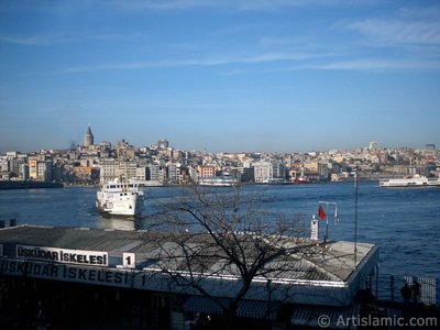 View of jetty, coast and historical Galata Tower from an overpass at Eminonu district in Istanbul city of Turkey. (The picture was taken by Artislamic.com in 2004.)