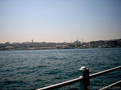 View of Eminonu coast, Ayasofya Mosque (Hagia Sophia) and Topkapi Palace from the shore of Karakoy in Istanbul city of Turkey. (The picture was taken by Artislamic.com in 2004.)