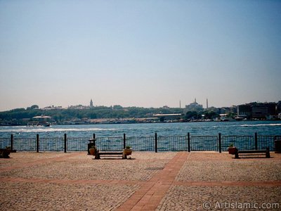 View of Eminonu coast, Ayasofya Mosque (Hagia Sophia) and Topkapi Palace from the shore of Karakoy in Istanbul city of Turkey. (The picture was taken by Artislamic.com in 2004.)