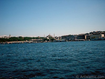 View of Eminonu coast, Ayasofya Mosque (Hagia Sophia) and Topkapi Palace from the shore of Karakoy in Istanbul city of Turkey. (The picture was taken by Artislamic.com in 2004.)