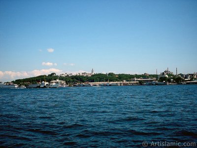 View of Eminonu coast, Ayasofya Mosque (Hagia Sophia) and Topkapi Palace from the shore of Karakoy in Istanbul city of Turkey. (The picture was taken by Artislamic.com in 2004.)