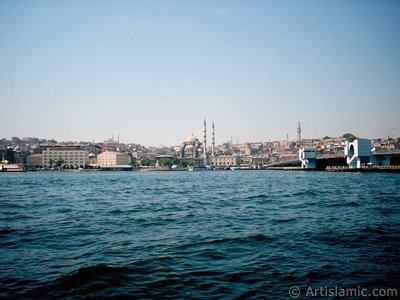 View of Eminonu coast, (from left) Sultan Ahmet Mosque (Blue Mosque), Yeni Cami (Mosque), (at far behind) Beyazit Mosque, Beyazit Tower and Galata Brigde from the shore of Karakoy in Istanbul city of Turkey. (The picture was taken by Artislamic.com in 2004.)