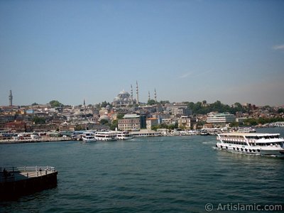 View of coast, (from left) Beyazit Tower, below Rustem Pasha Mosque and above it Suleymaniye Mosque from Galata Bridge located in Istanbul city of Turkey. (The picture was taken by Artislamic.com in 2004.)