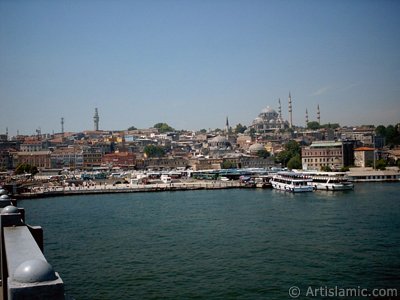 View of coast, (from left) Beyazit Tower, below Rustem Pasha Mosque and above it Suleymaniye Mosque from Galata Bridge located in Istanbul city of Turkey. (The picture was taken by Artislamic.com in 2004.)