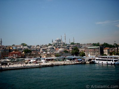 View of coast, (from left) Beyazit Tower, below Rustem Pasha Mosque and above it Suleymaniye Mosque from Galata Bridge located in Istanbul city of Turkey. (The picture was taken by Artislamic.com in 2004.)