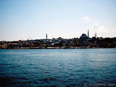View of Eminonu coast, (from left) Beyazit Mosque, Beyazit Tower, (below) Rustem Pasha Mosque and (above) Suleymaniye Mosque from the shore of Karakoy-Persembe Pazari in Istanbul city of Turkey. (The picture was taken by Artislamic.com in 2004.)