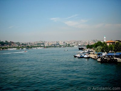 View of Sarachane coast, on the horizon on the left Fatih Mosque, on the right Yavuz Sultan Selim Mosque and a small mosque from Galata Bridge located in Istanbul city of Turkey. (The picture was taken by Artislamic.com in 2004.)