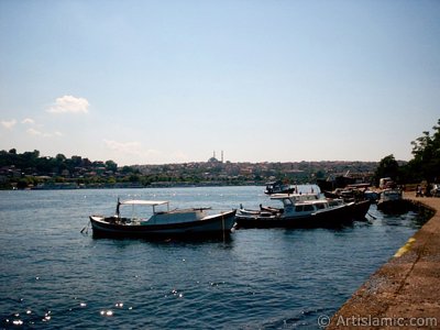 View of Sarachane coast and on the horizon Fatih Mosque from the shore of Karakoy-Persembe Pazari in Istanbul city of Turkey. (The picture was taken by Artislamic.com in 2004.)