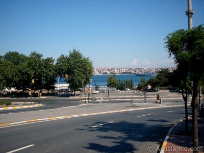 View of Dolmabahce coast and Valide Sultan Mosque`s minaret in Dolmabahce district in Istanbul city of Turkey. (The picture was taken by Artislamic.com in 2004.)