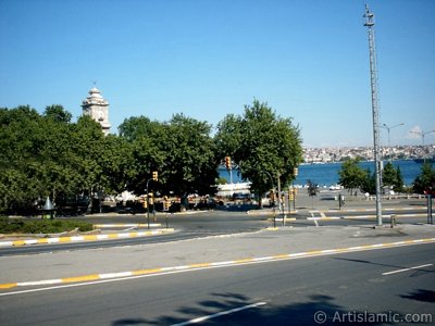 View of Dolmabahce coast and clock tower in Dolmabahce district in Istanbul city of Turkey. (The picture was taken by Artislamic.com in 2004.)