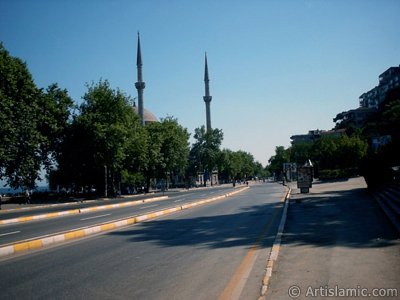 View of Dolmabahce coast and Valide Sultan Mosque in Dolmabahce district in Istanbul city of Turkey. (The picture was taken by Artislamic.com in 2004.)