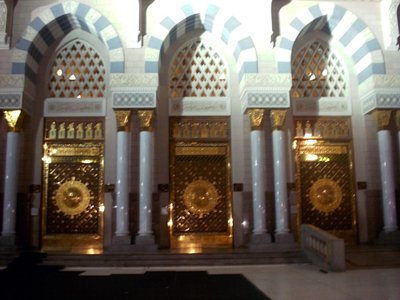 Some of the entrance doors of the Prophet Muhammad`s (saaw) Mosque (Masjed an-Nabawe) in Madina city of Saudi Arabia. (The picture was taken by Mr. Mustafa one of the visitors of Artislamic.com in 2003 Ramadan.)