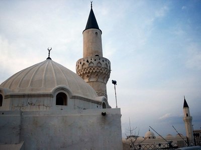 The Mosque of Hadrat Abu Bakr (ra) (first caliph of Islam) and behind it the Mosque of Hadrat Ali (ra) (fourth caliph of Islam) nearby the Prophet Muhammad`s (saaw) Mosque in Madina city of Saudi Arabia. These mosques had been builded by Ottoman and there used to be the homes of Hadrat Abu Bakr and Ali over the places the mosques cover. (The picture was taken by Mr. Mustafa one of the visitors of Artislamic.com in 2003 Ramadan.)