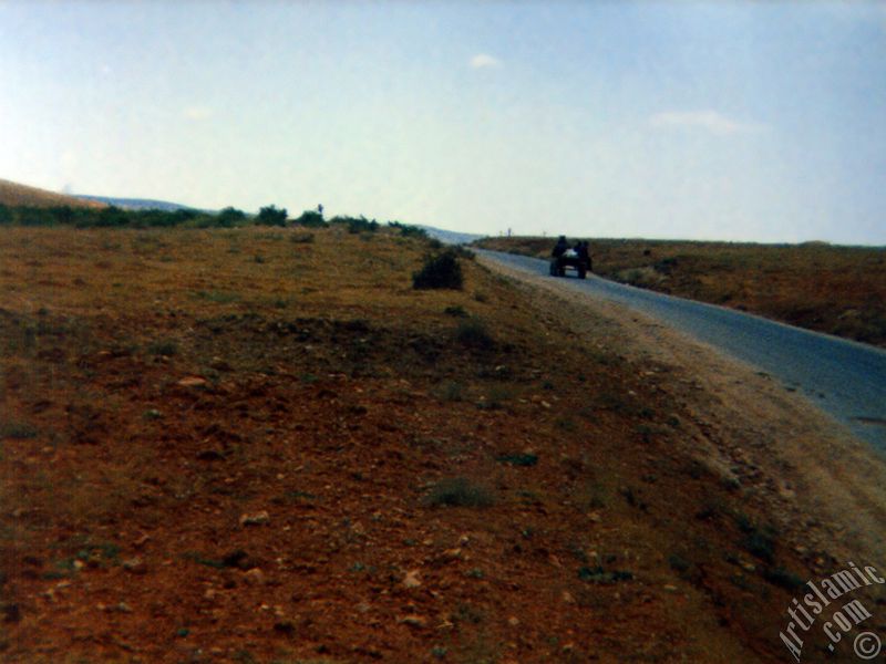 View of a village`s way and villagers on a tractor in Gaziantep city of Turkey.
