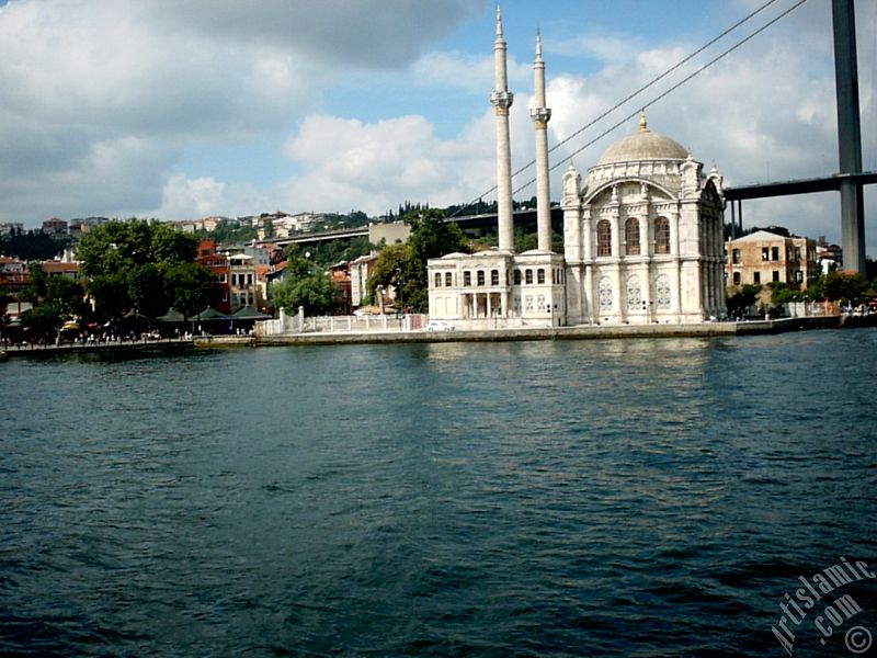View of Ortakoy coast, Ortakoy Mosque and Bosphorus Bridge from the Bosphorus in Istanbul city of Turkey.
