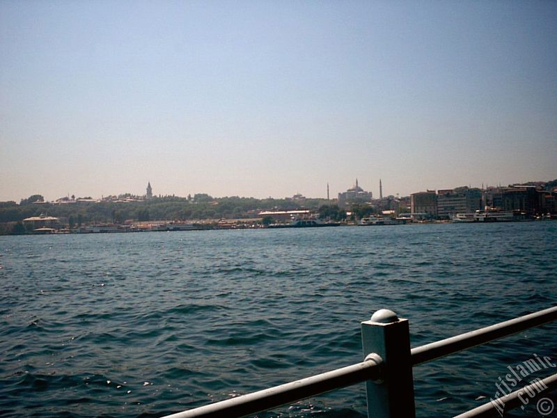 View of Eminonu coast, Ayasofya Mosque (Hagia Sophia) and Topkapi Palace from the shore of Karakoy in Istanbul city of Turkey.
