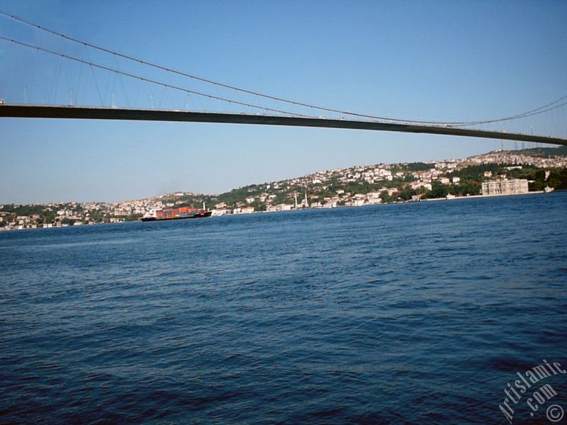 View of Bosphorus Bridge and Beylerbeyi coast from a park at Ortakoy shore in Istanbul city of Turkey.
