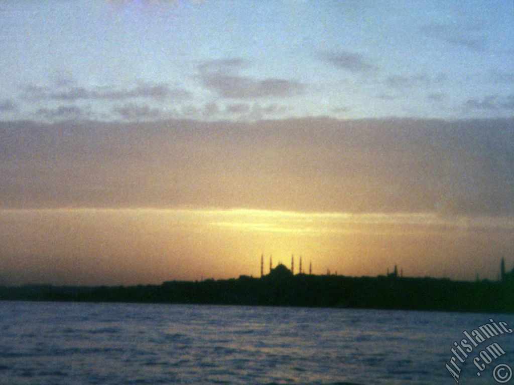 A sunset view of Sarayburnu coast and Sultan Ahmet Mosque (Blue Mosque) from the Bosphorus in Istanbul city of Turkey.
