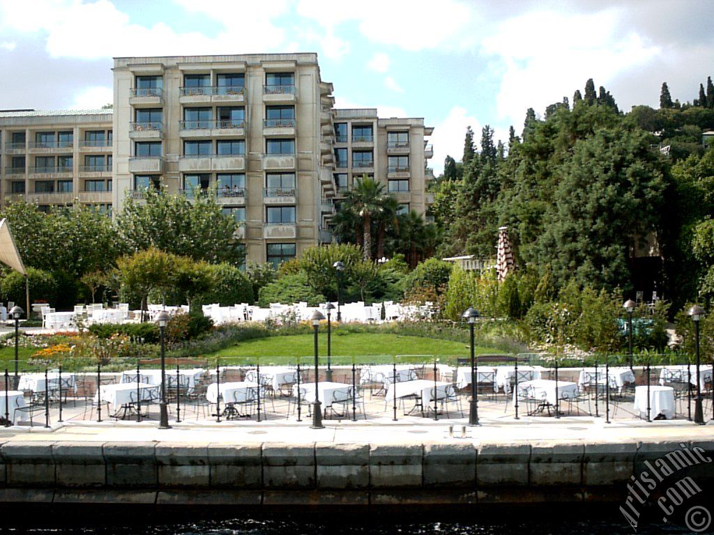 View of the Ciragan Palace`s gargen from the Bosphorus in Istanbul city of Turkey.
