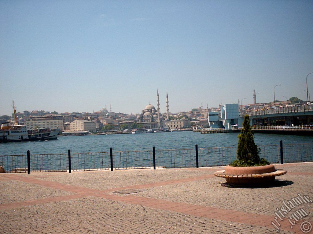 View of Eminonu coast, (from left) Sultan Ahmet Mosque (Blue Mosque), Yeni Cami (Mosque), (at far behind) Beyazit Mosque, Beyazit Tower and Galata Brigde from the shore of Karakoy in Istanbul city of Turkey.
